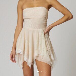 Nude Asymmetric Mini Dress